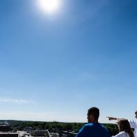 Students outside the Center for Interprofessional Health looking over the patio